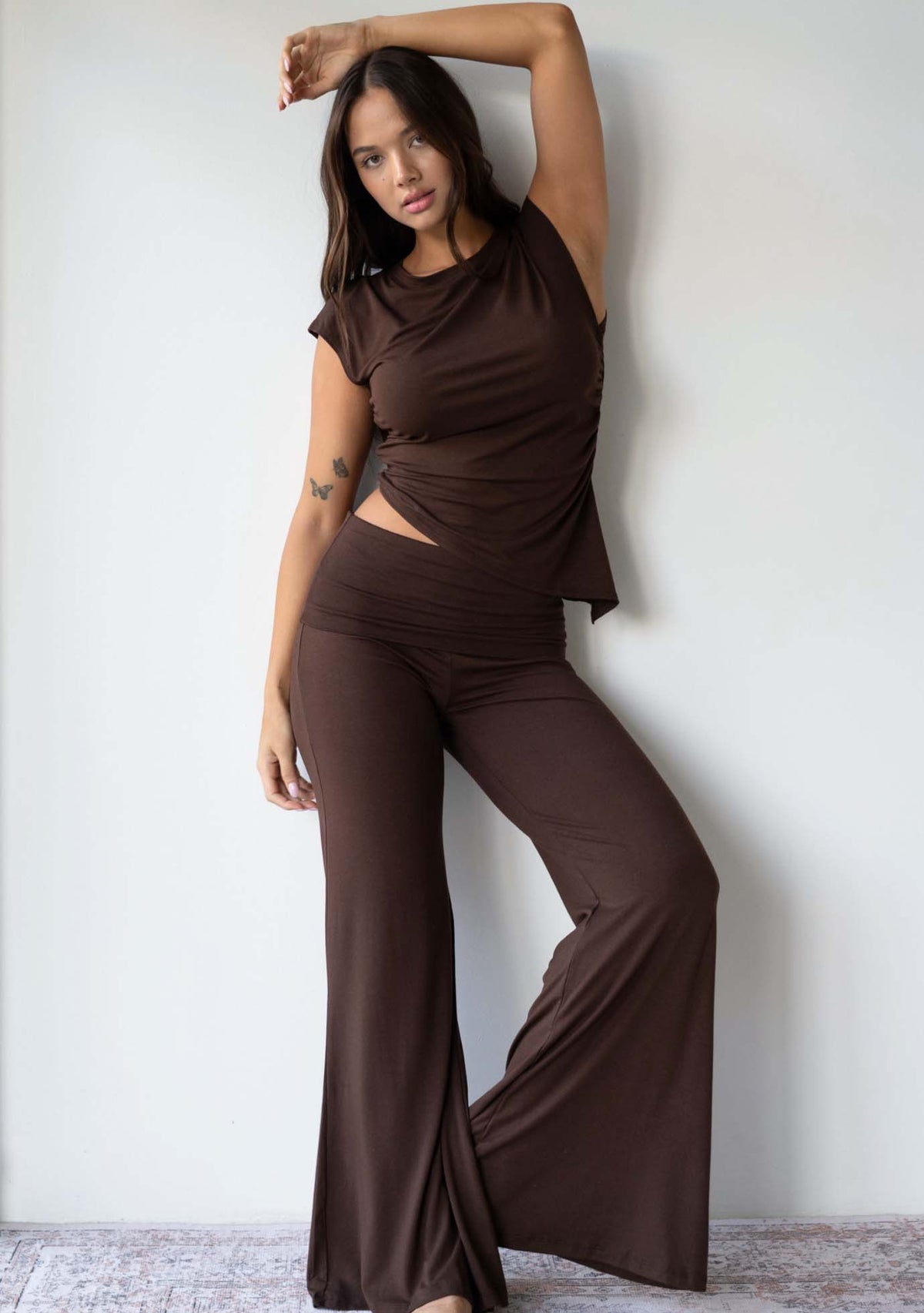 Model wearing the JALA Align Tee in Espresso, full length lifestyle shot