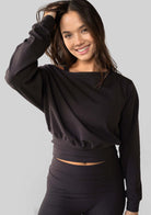 Model wearing the JALA Aela Top in Chocolate, styled front view