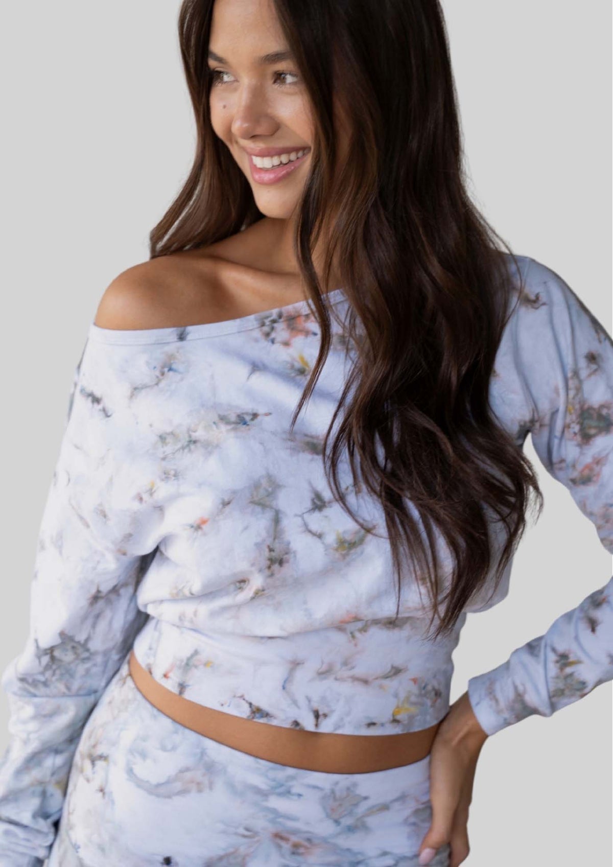 Model wearing the JALA Aela Top in Morel, a hand dyed pullover with a wide scoop neck, front view