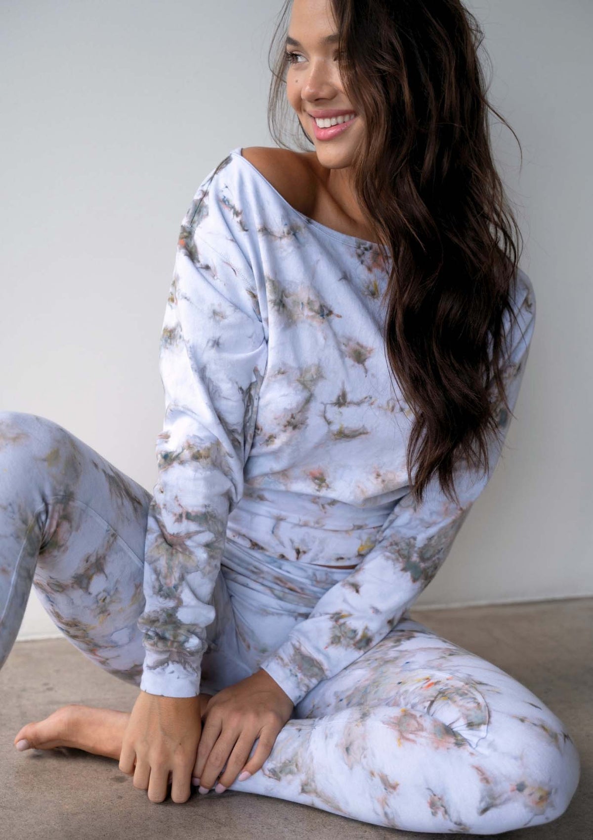 Model wearing the JALA Aela Top in Morel, relaxed lifestyle shot