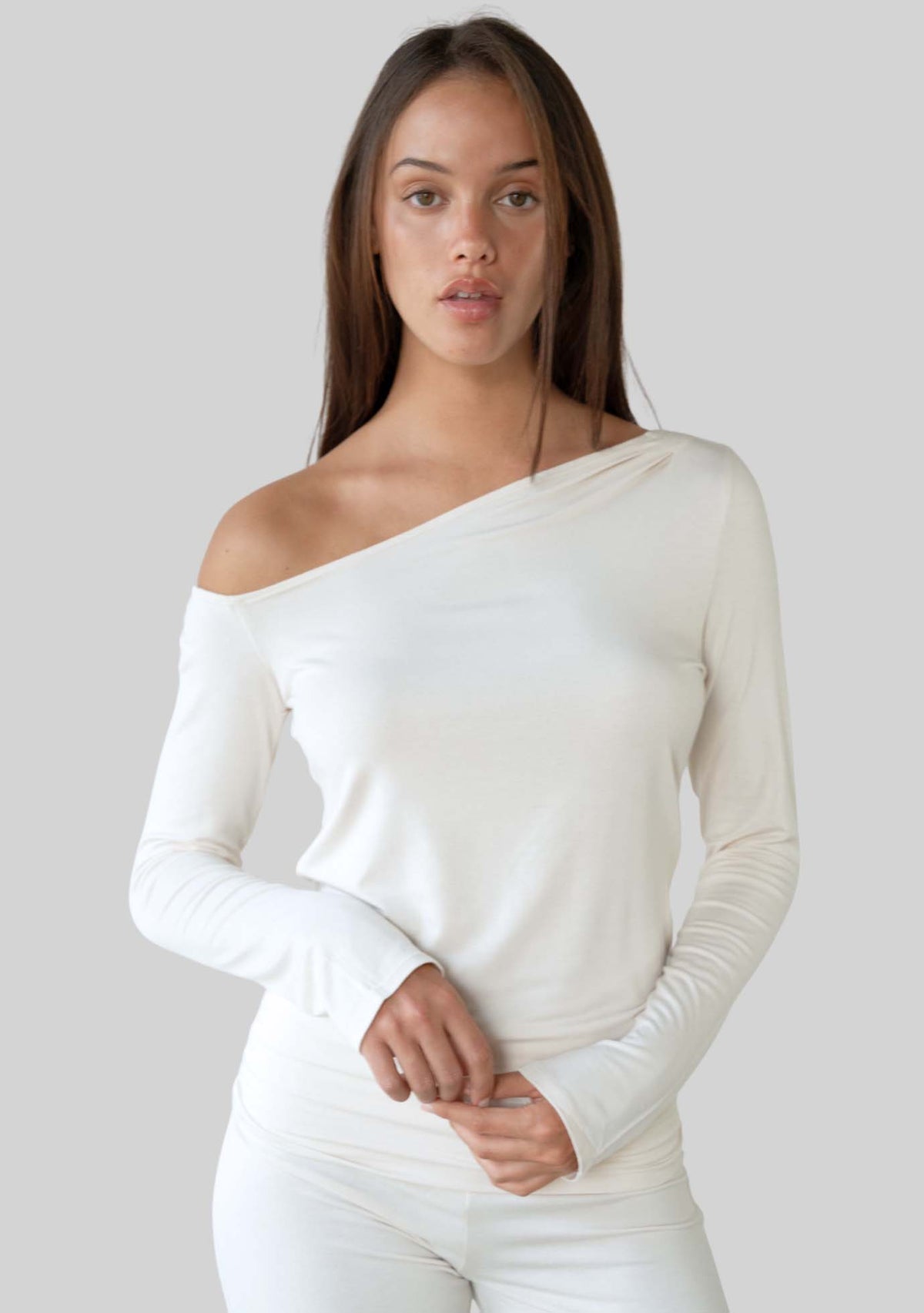 Jala Aria Top in Cream - model photo. [label] Amelia is 5'9" S