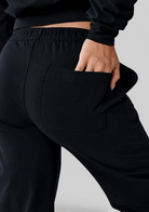 Close up of the pocket detail on the JALA Bliss Barrel Pant in Black