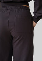 Close up of the pocket detail on the JALA Bliss Barrel Pant in Chocolate