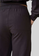 Close up of the pocket detail on the JALA Bliss Barrel Pant in Chocolate