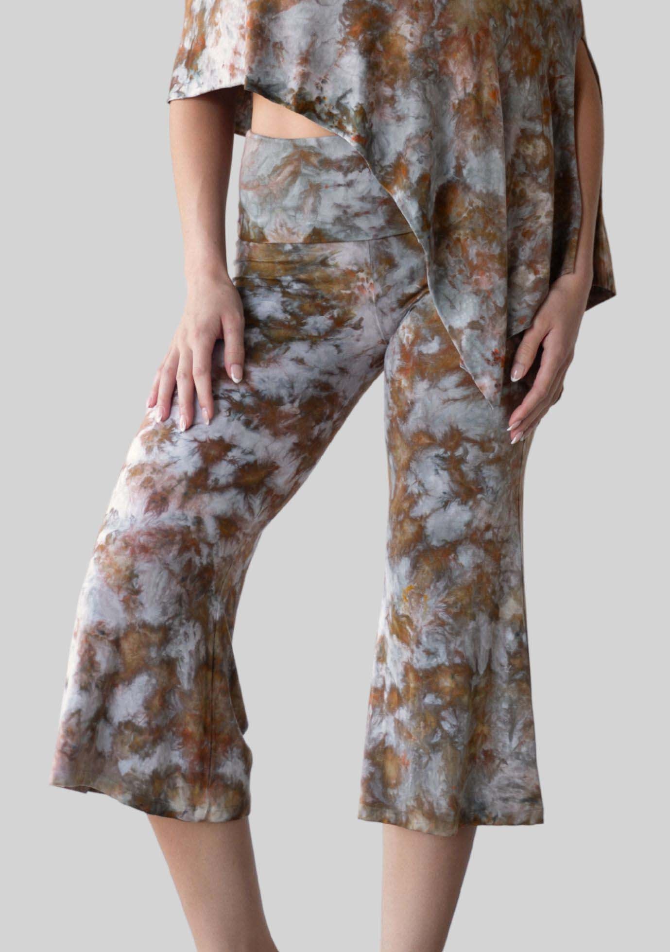 Jala Chill Yoga Capri in Terra - front view. [label] Athena is 5'9" XS