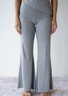 Model wearing the JALA Chill Yoga Pant in Heather Grey, front view