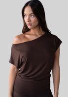 Model wearing the JALA Dreamer Dolman Tee in Espresso with soft dolman sleeves, front view