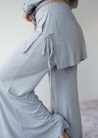 Close up of the side tie detail on the JALA Luna Pant in Heather Grey