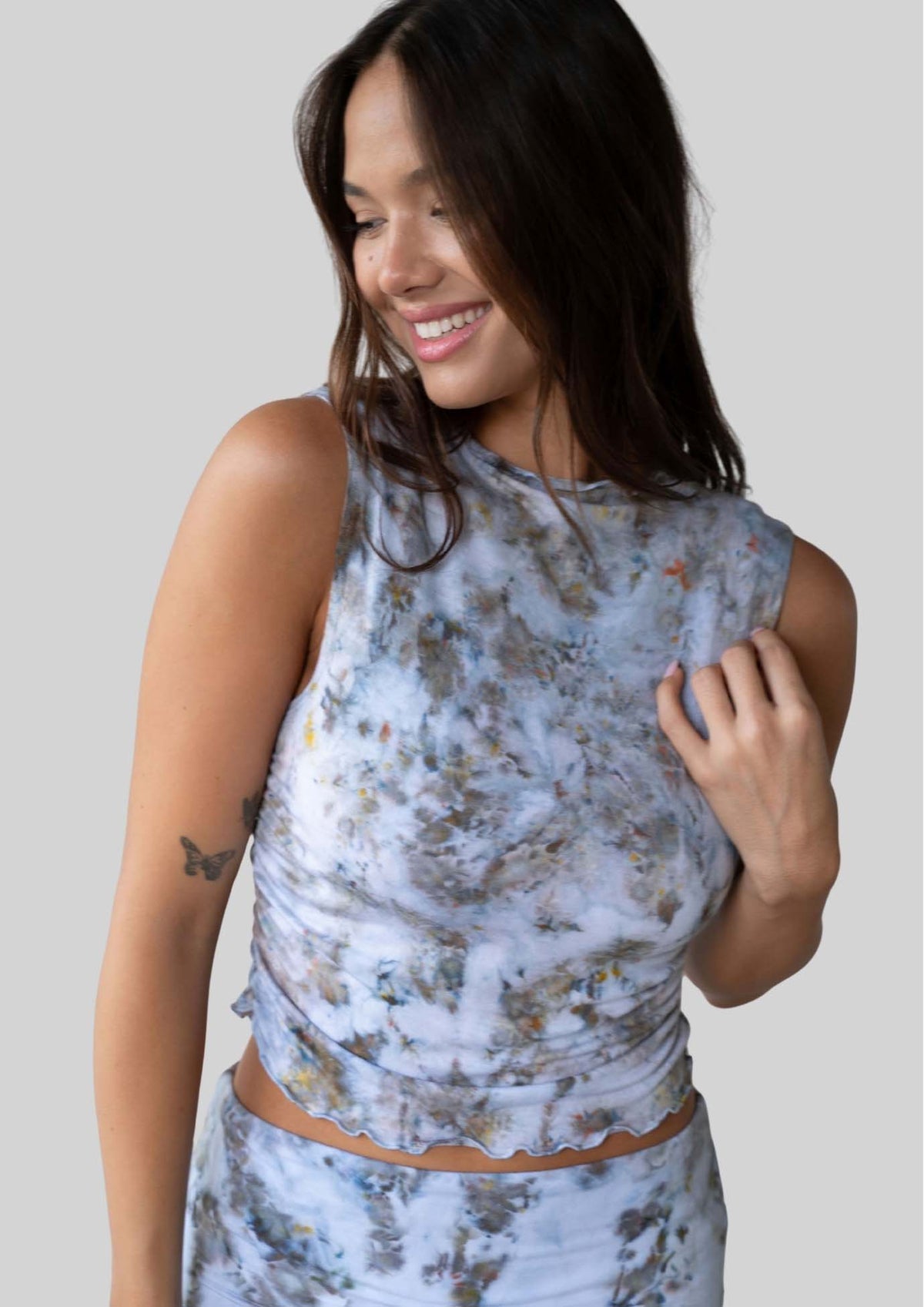 Model wearing the JALA Whisper Tank in Morel, styled front view