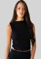 Jala Whisper Tank in Black - model photo. [label] Amelia is 5'9" S