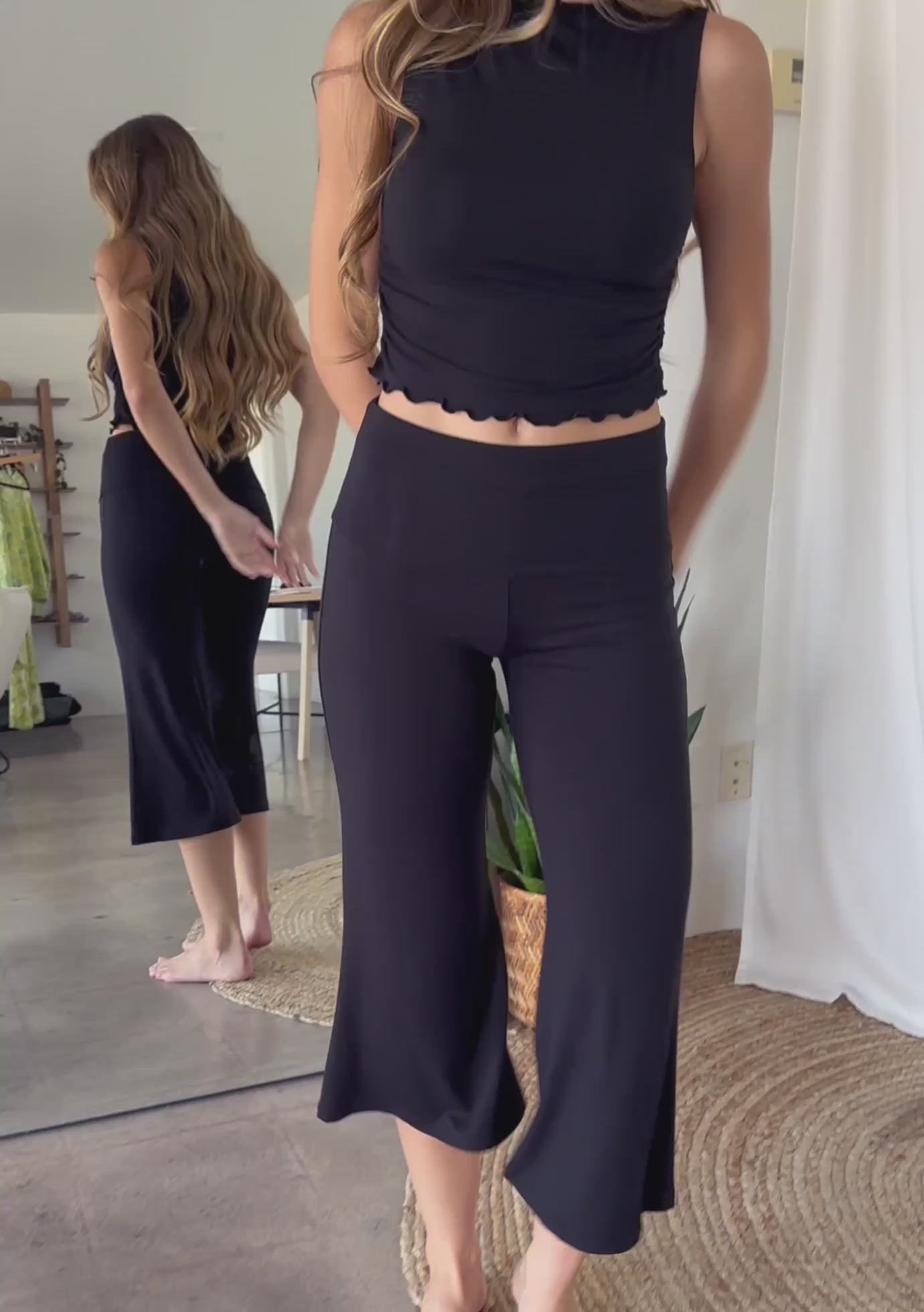 Jala Chill Yoga Capri in Black - video showing clothing movement